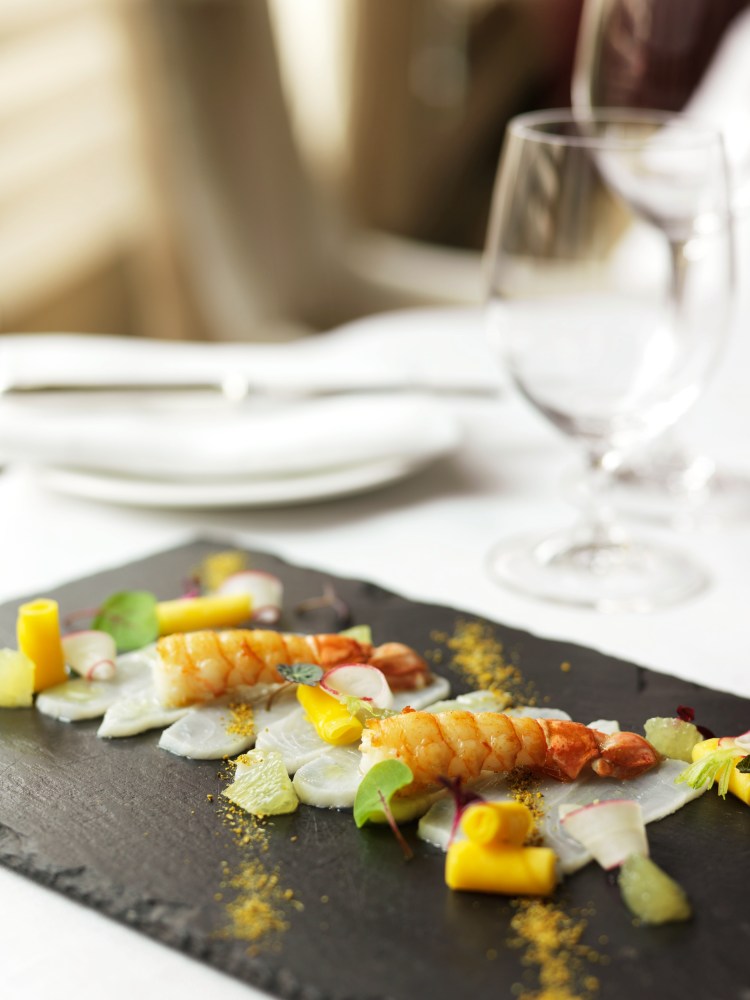 Lime marinated halibut with roasted langoustines, mango and fennel pollen